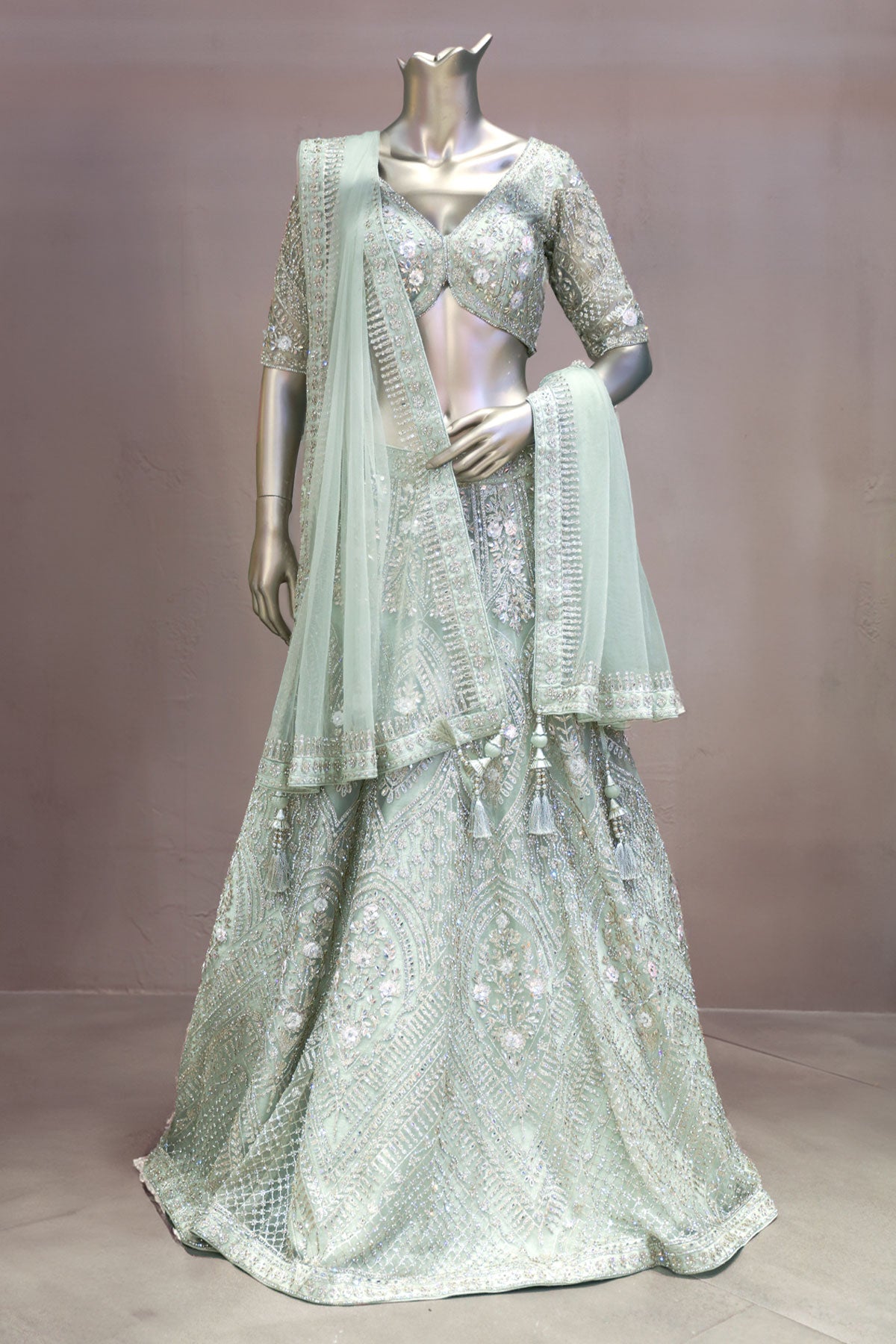 Pista Green Net Hand-Embroidered Lehenga