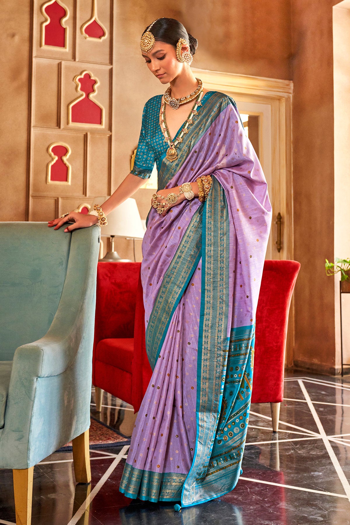 Mauve Silk Zari Woevn Printed Patola Saree