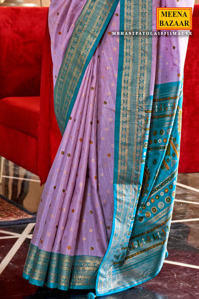 Mauve Silk Zari Woevn Printed Patola Saree