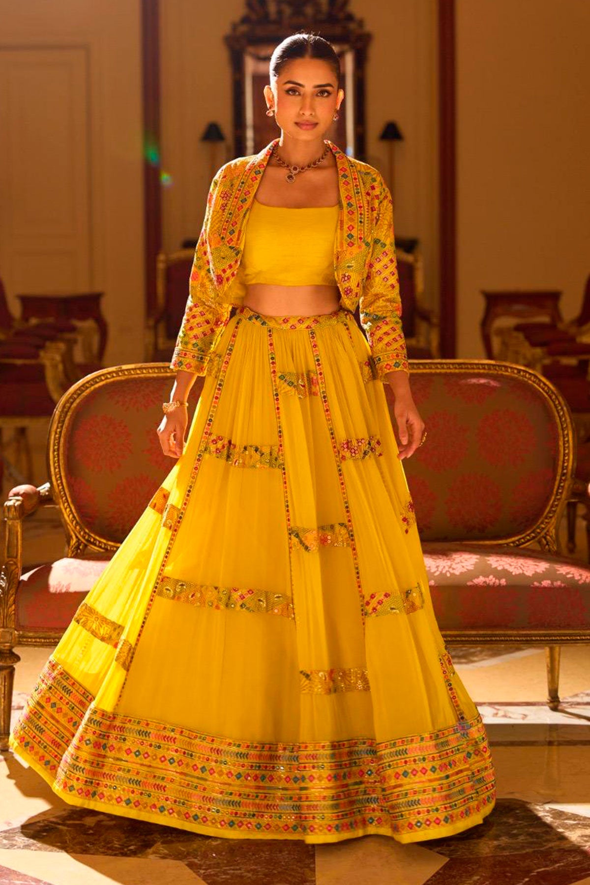Mustard Heavy Embroidered Georgette Lehenga with Short Shrug