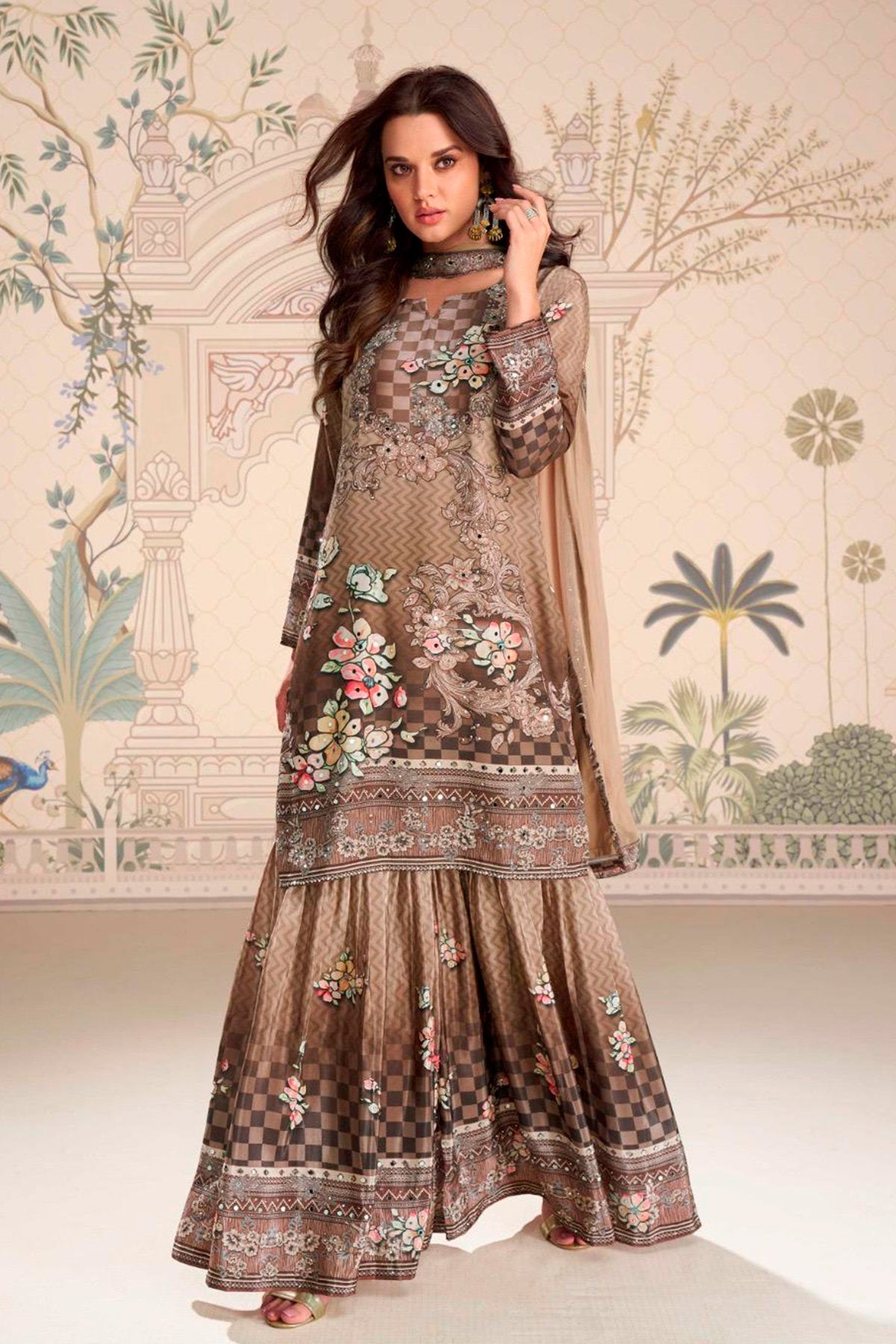 Woman wearing a floral embroidered outfit with a decorative background