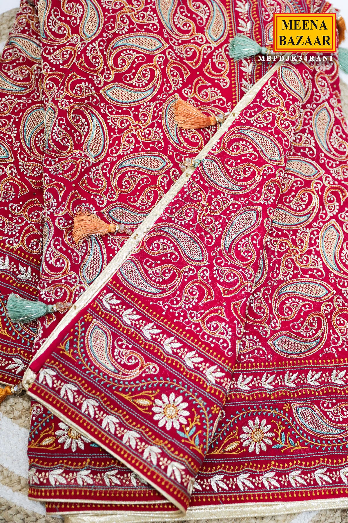 Graceful Rani Pink Georgette Saree with Embroidered Detailing