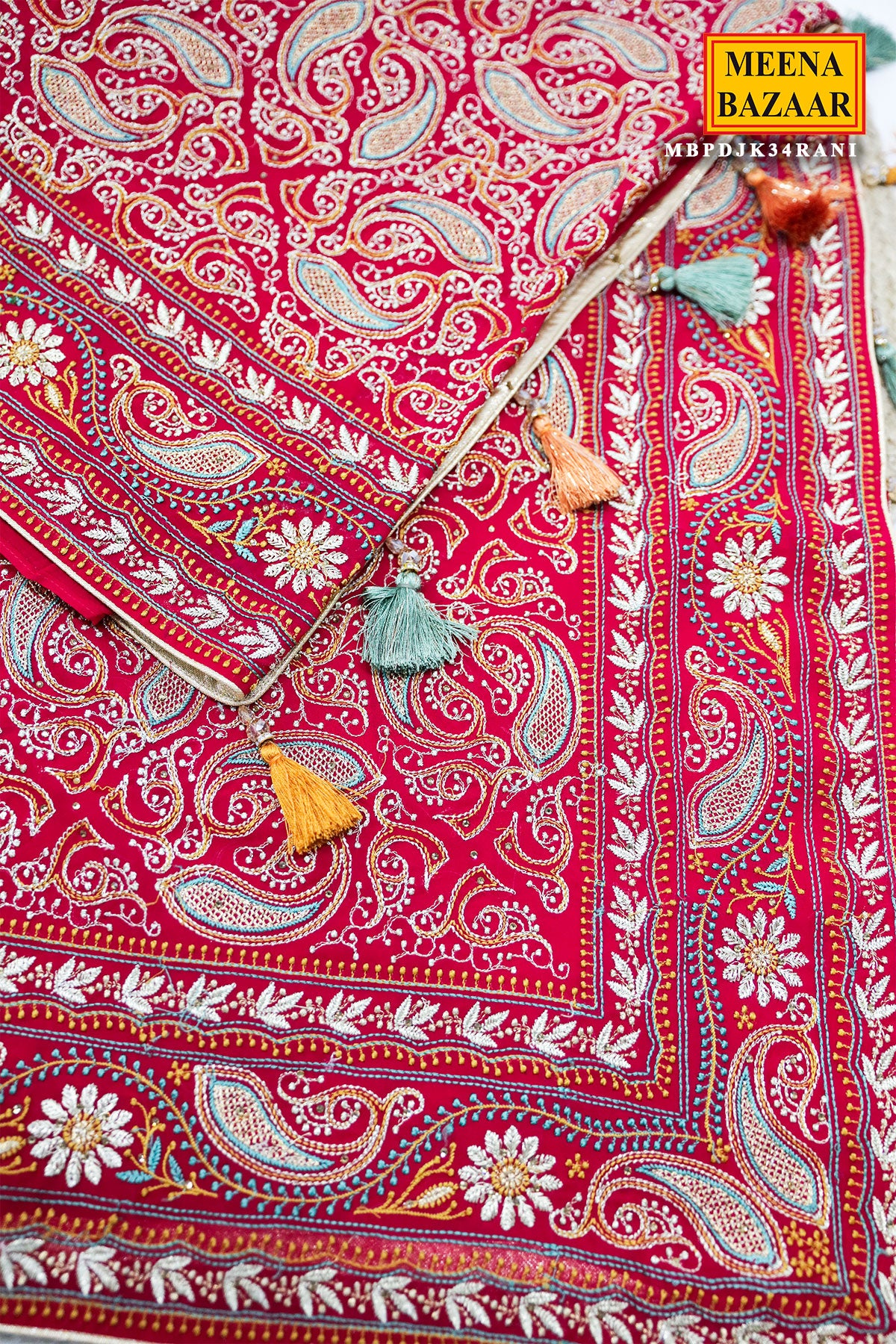 Graceful Rani Pink Georgette Saree with Embroidered Detailing