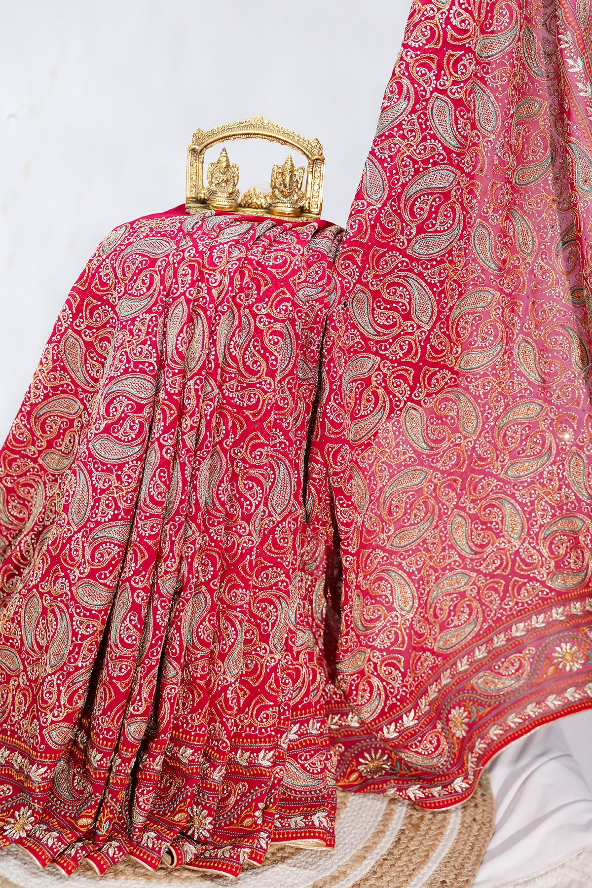 Graceful Rani Pink Georgette Saree with Embroidered Detailing