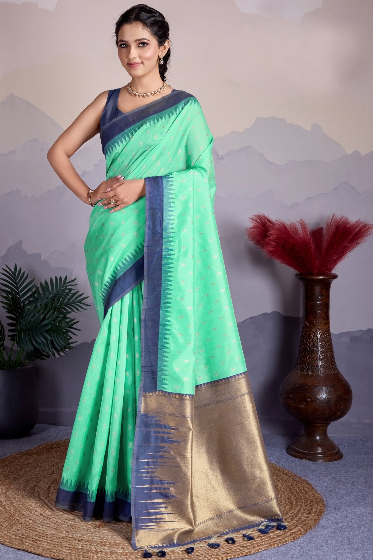 Sea Green Organza Saree With Zari Woven Motifs Print