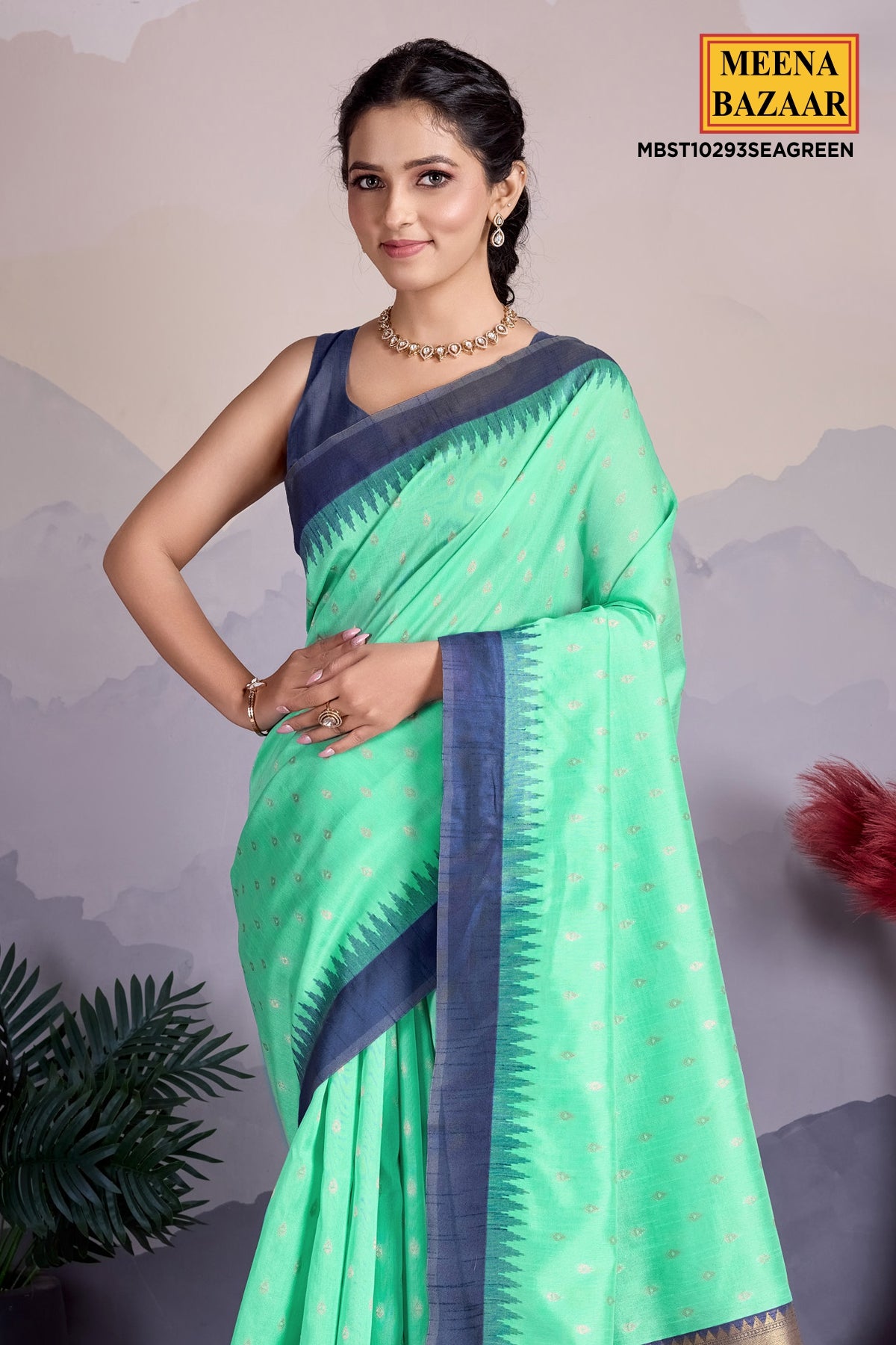 Sea Green Organza Saree With Zari Woven Motifs Print