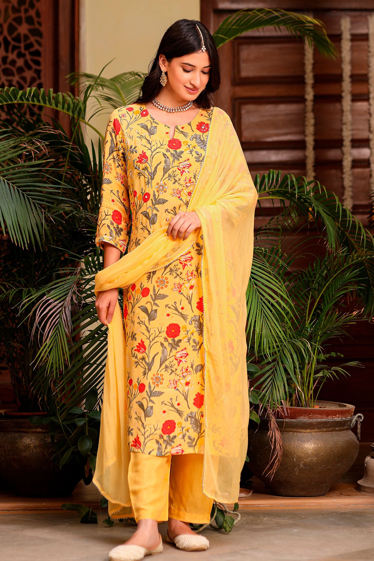 Yellow Crepe Floral Printed Beads and Cutdana Embroidered Suit